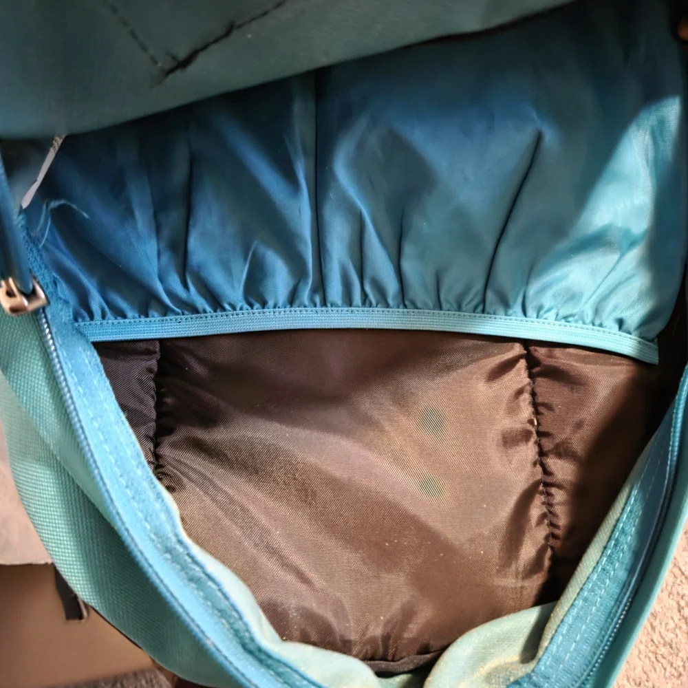 JanSport Turquoise and Brown Unisex Backpack.